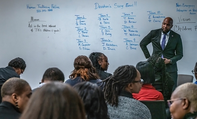 Child welfare workers with the Tennessee Department of Children&amp;#039;s Services prepare on Friday for a weekend of working with families in Nashville. (Photo: John Partipilo)