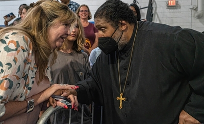 State Rep. Gloria Johnson, D-Knoxville, greets Bishop William Barber, II at Fisk University in Nashville. (Photo: John Partipilo)